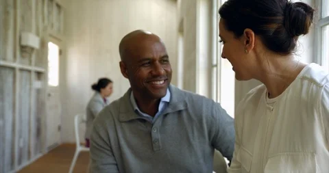 Two colleagues having a discussion. Stock-Footage 88376469