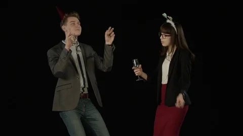 Two colleagues having fun at a party Stock Footage 77742953