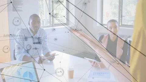 Two colleagues lowering tablets while presenter stepping forward, gesturing and Stock Footage 331712685