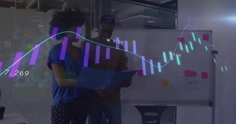 Two colleagues reviewing folder in business office, showing floating bar charts Stock Footage 307449107
