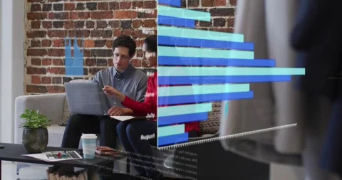 Two colleagues sitting, animated data charts appearing, woman pointing man Stock Footage 333833146