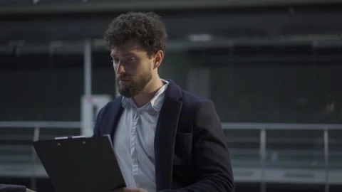 Two colleagues talking and working together at workplace without other people 스톡 동영상 131046913