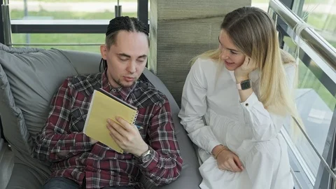 Two colleagues working together discuss project and talking about work problem. Video stock 115911117