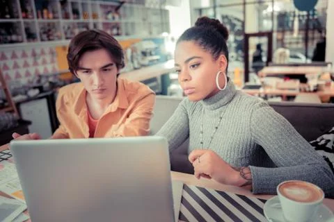 Two college students learning new programming skills together Stock Photos