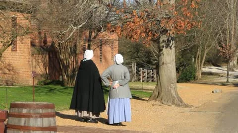 Two colonial women chat Stock-Footage 10828073