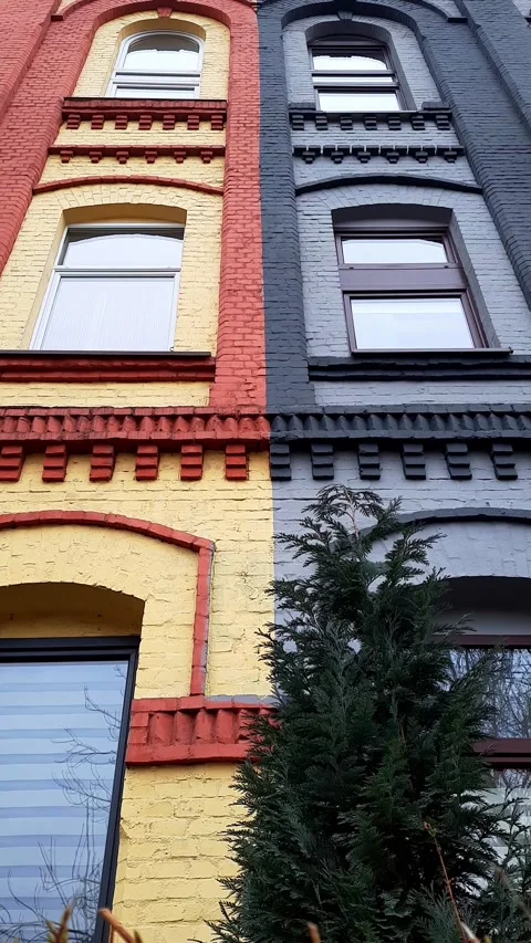 Two-color facade of old historical building after reconstruction. Stock Footage 267890713