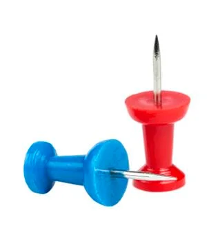 Two colored pushpins isolated Stock Photos