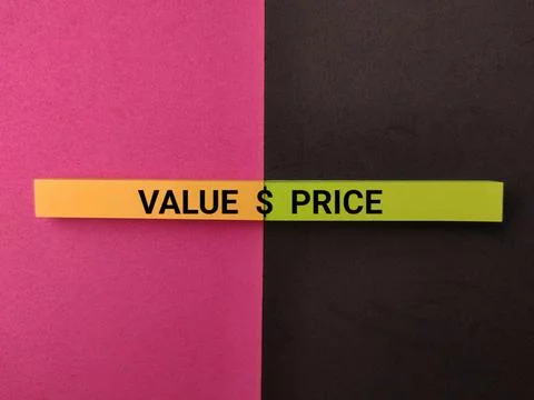 Two colored strips forming the text VALUE $ PRICE sit centered across a spl.. 写真素材