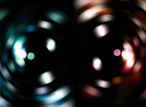 Two colorful blur vortexes isolated on black background. Stock Photos