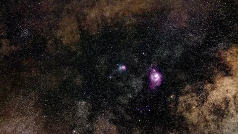 Two colorful nebulae in space with a multitude of Milky Way stars Stock Footage 114891924