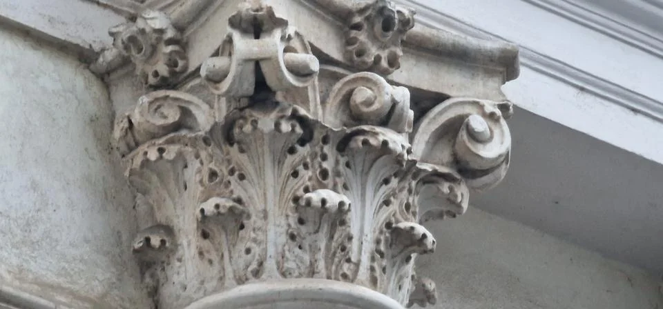 Two column heads with leaf decorations Stock Photos