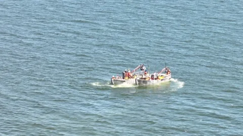 Two commercial boats navigating in tight circle 스톡 동영상 280447809