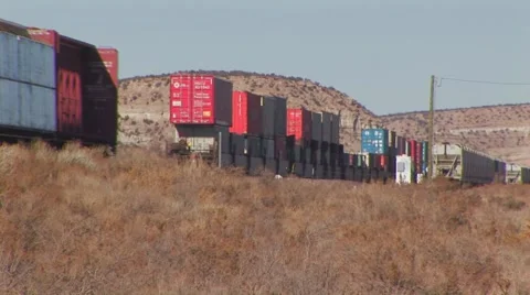 Two commercial boxcar trains Stock Footage 60737152