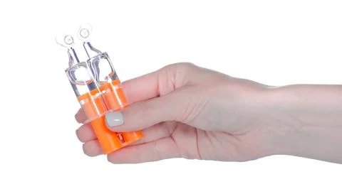 Two-component adhesive epoxy resin in hand Stock Photos