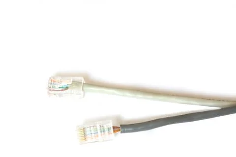 Two computer network cables. rj45 plugs. isolated on white Stock Photos