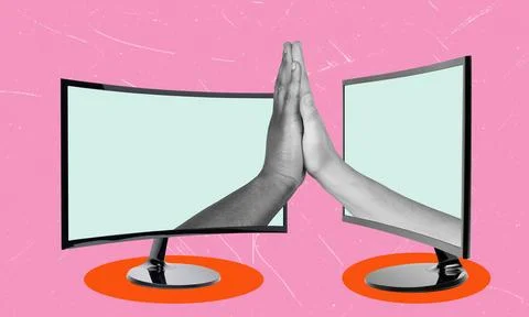 Two computer screens face each other with hands extended from each, symbolizi Stock Photos