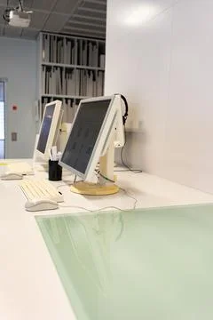 Two computers are on the table Stock Photos