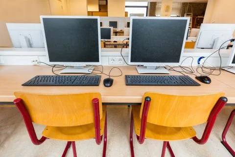 Two computers in classroom on high school Stock Photos