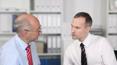 Two concerned businessmen in a meeting Stock-Footage 26836486