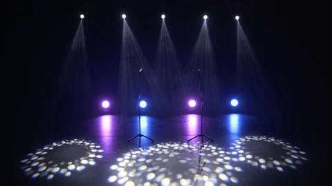 Two concert microphones in front of a large audience. Stock Footage 225534874
