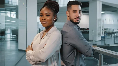 Two confident workers multiracial diverse business co-workers colleagues Stock Footage 172249525