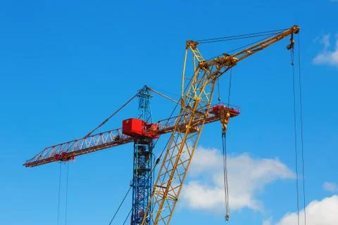 Two construction cranes Stock Photos