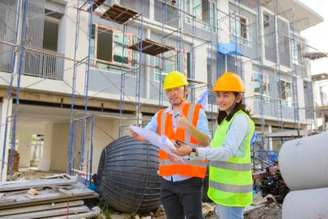 Two construction engineers working together Stock Photos