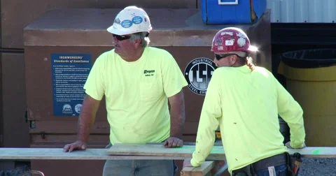 Two Construction Workers Talking - 4k Stock Footage 53891587