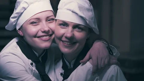 Two cook women having fun in a kitchen Stock Footage 74920144
