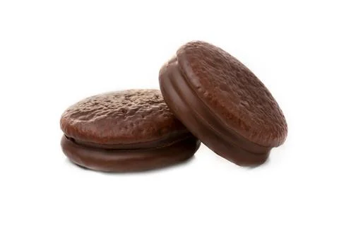 Two cookies in chocolate choco pie closeup on a white. Isolated Stock Photos