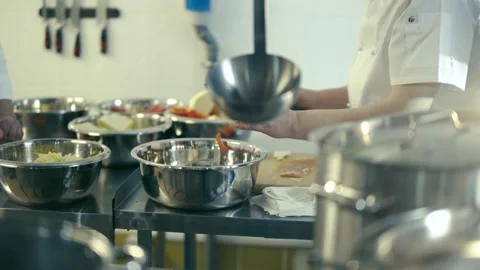 Two cooks in the kitchen Video stock 148829034