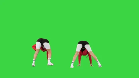 Two cool b-girls dancing synchronously on a Green Screen, Chroma Key. Stock Footage 214388523
