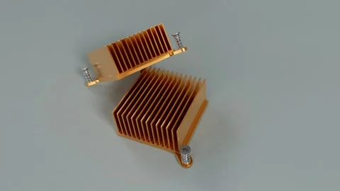 Two Copper Heatsinks Of Different Sizes Placed Together Vídeo Stock 334979562