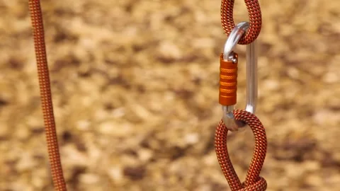 Two Cord Loops Connected with a Carabiner Stock Footage 265129672