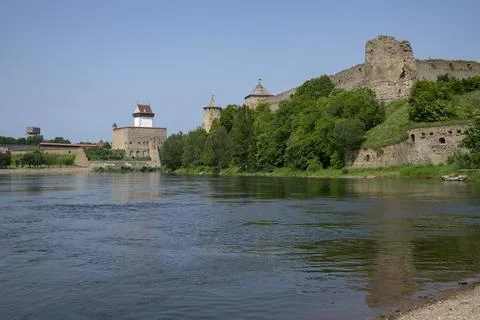 Two countries - two fortresses on the Narova River. Border of Russia and Estonia Stock Photos