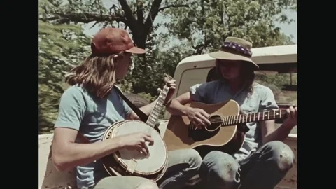 Two Country Boys Playing Banjo And Guitar On Traveling Pick Up Car Stock Footage