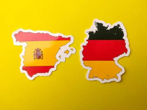 Two country map stickers representing Spain and Germany are positioned side.. Stock Photos
