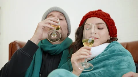 Two couples are drinking champagne in a room to cool off. Stock Footage 155283674