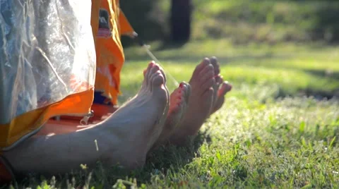 Two couples legs in tent Video stock 46677760