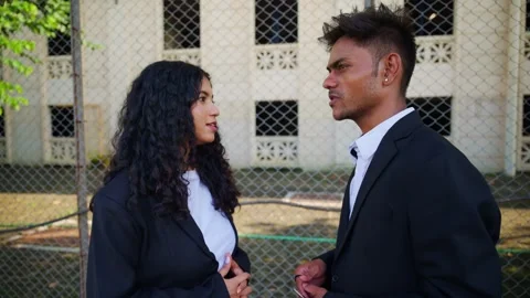 Two Coworkers chat casually Stock Footage 295522072