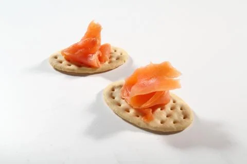 Two cracker with salmon on white Stock Photos