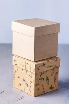 Two Craft Gift Boxes on Gray Background Holiday Concept Vertical Stock Photos