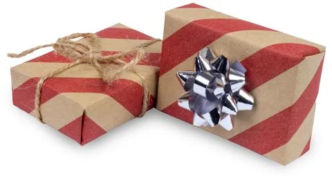 Two craft gift boxes wrapped in striped brown and white paper with boes isolated Stock Photos