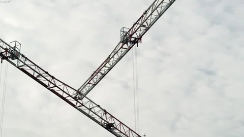 Two Crane booms moving Stock Footage 321430104
