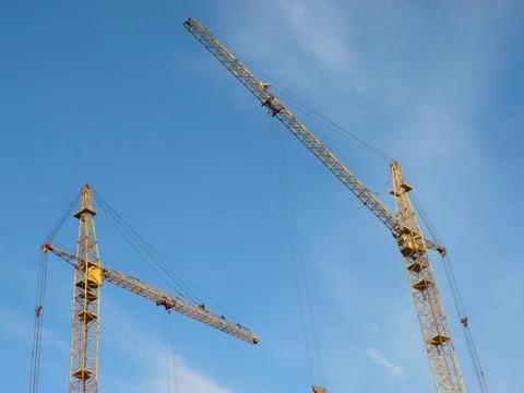 Two crane towers on sky background 写真素材