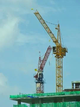 Two crane on the under construction building Stock Photos