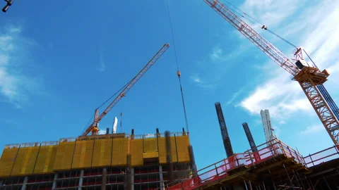 Two Cranes at a Construction Site Stock Footage 240512199