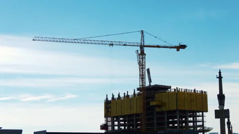Two Cranes Moving at a Construction Site Video stock 240513165