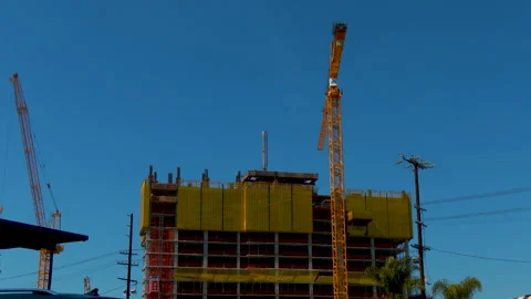 Two Cranes Moving at a Construction Site Stock-Footage 240513433