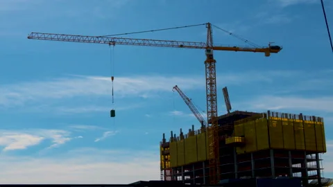 Two Cranes Moving at a Construction Site Stock-Footage 240524440